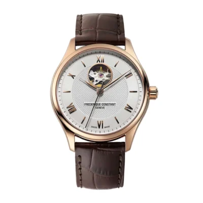 Frederique Constant FC-310MV5B4 với mặt số màu trắng, cọc số la mã, ô lộ cơ góc 12h, kim chỉ giờ màu vàng hồng, vỏ vàng hồng sang trọng, dây da vân cá sấu màu nâu