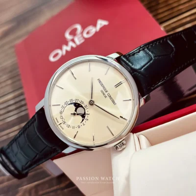 Frederique Constant FC-705BG4S6 like new – mặt số vàng nhạt nổi bật với ô lịch moonphase ở vị trí 6 giờ, kim trắng và cọc số thanh mảnh, tạo nên vẻ đẹp cổ điển đầy trang nhã.