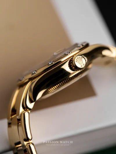 Núm chỉnh giờ Rolex vàng khối 18kt